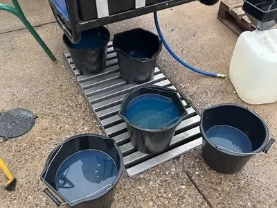 Fuel tank being drained and cleaned during industrial diesel hot pressure washer repair in Dover.